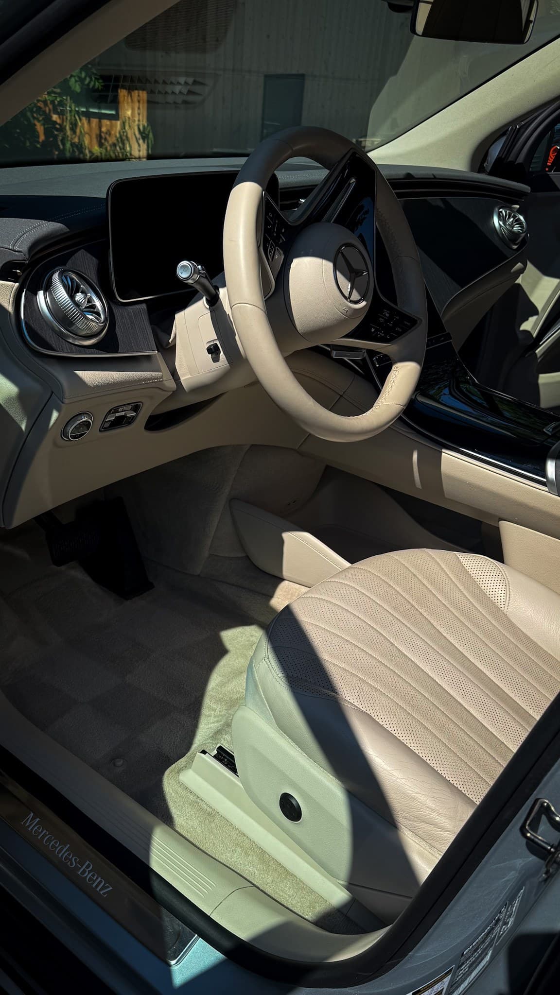 A cream leather interior and door card after an interior detail